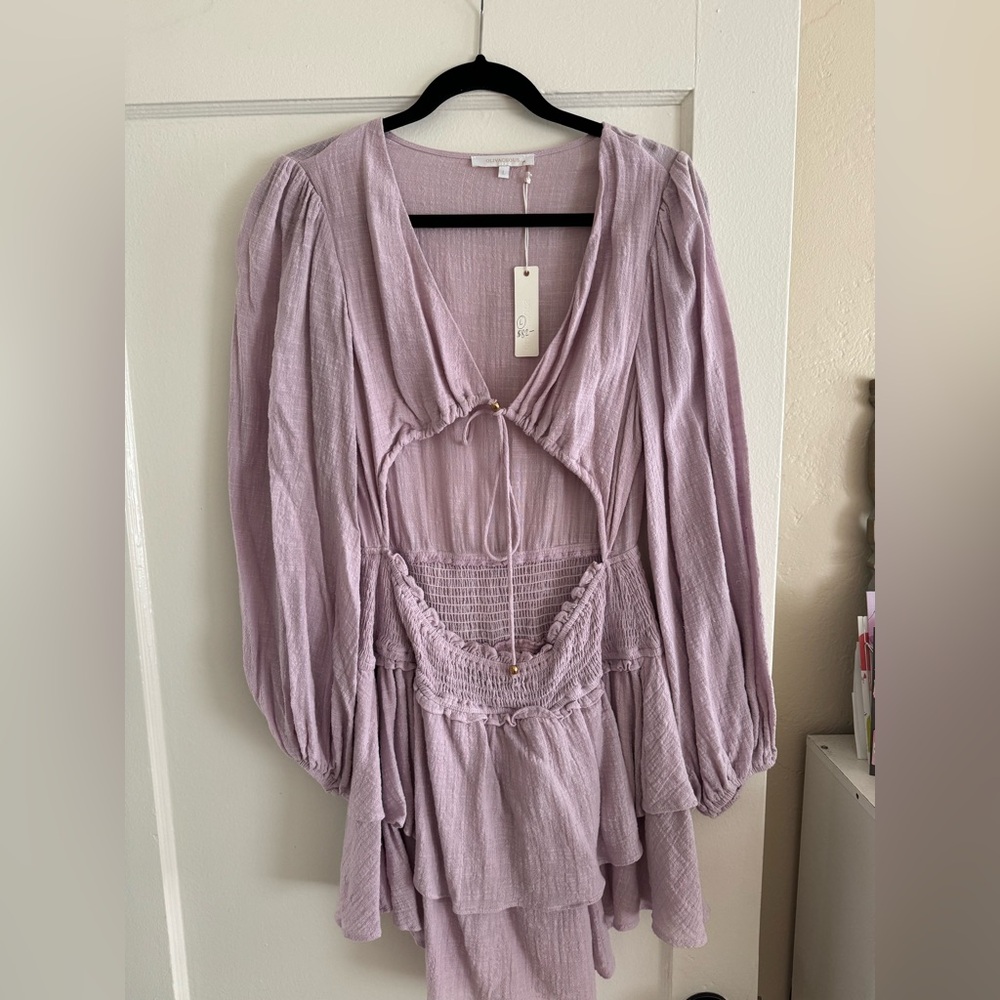 Cute and flattering lavender dress! Never worn with tags!!